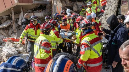 I.S.A.R. volunteers are treating an injured person