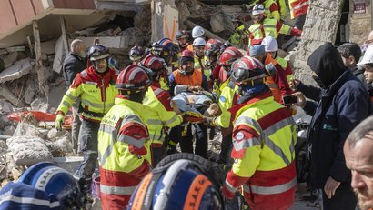 I.S.A.R. volunteers are treating an injured person