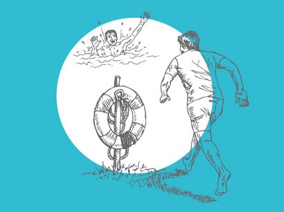 A person rushes to help someone who is drowning