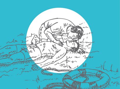 A person checks the breathing of a drowning person
