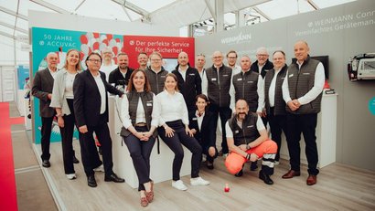 WEINMANN team at trade fair - 50 years of ACCUVAC, focus on modern medical technology for emergency ventilation and rescue services.